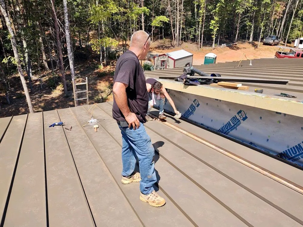 Finished asphalt shingle roof on a brick ranch home near Newton, NC