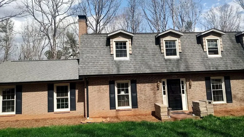 New roof and seamless gutter installation on a Foothills home, NC