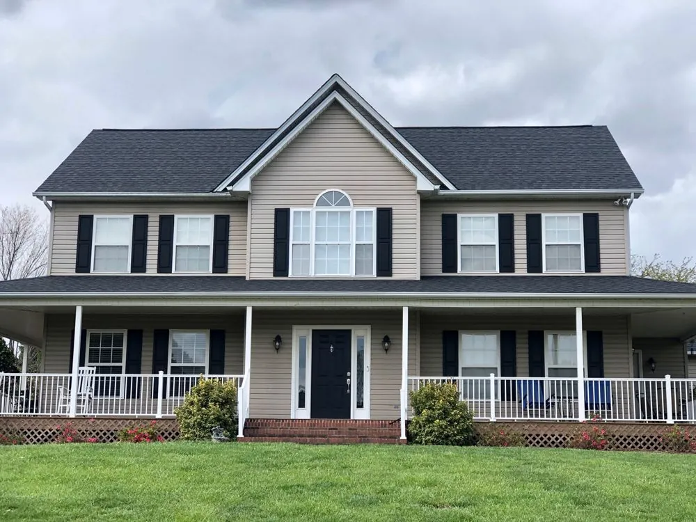Shingle roof repair and flashing replacement on a chimney, NC Foothills