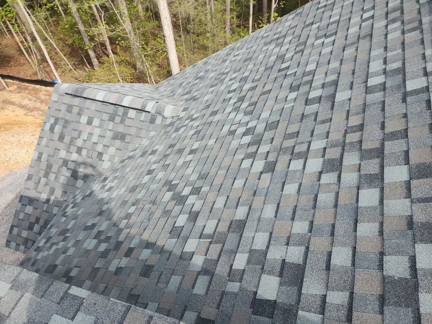 TAMKO Thunderstorm Grey architectural shingles on a new home roof in Lenoir, NC by S&S Roofing