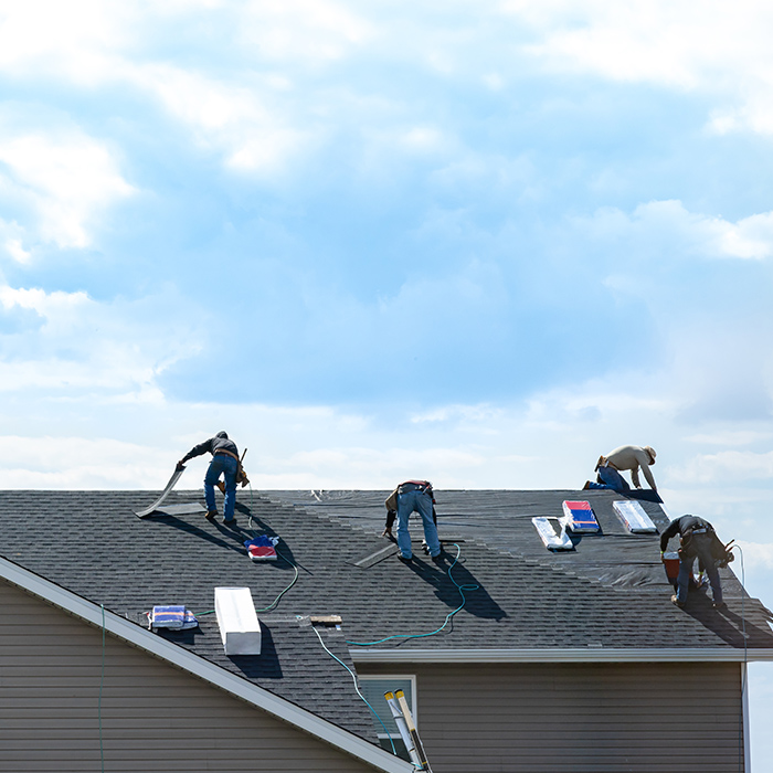 contractors-on-top-of-residential-property-installing-asphalt-shingles-taylorsville-nc