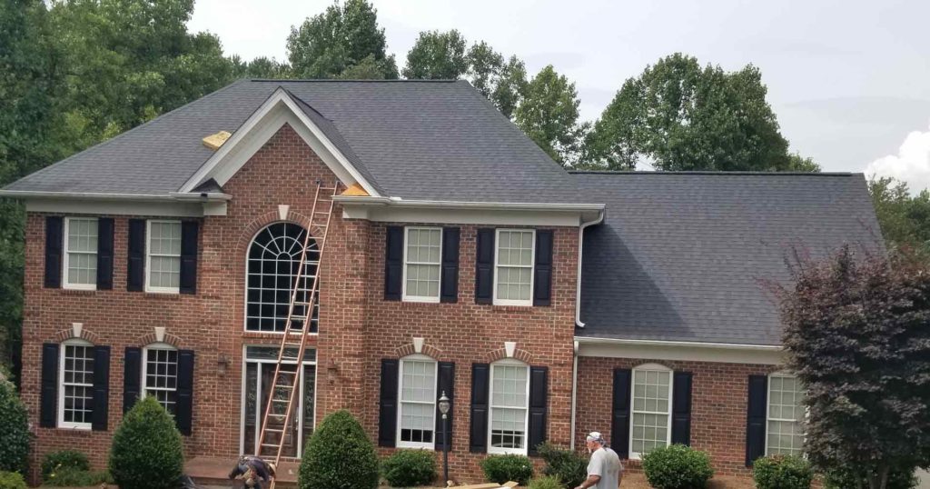 house-roofing-with-ladder-in-taylorsville-nc